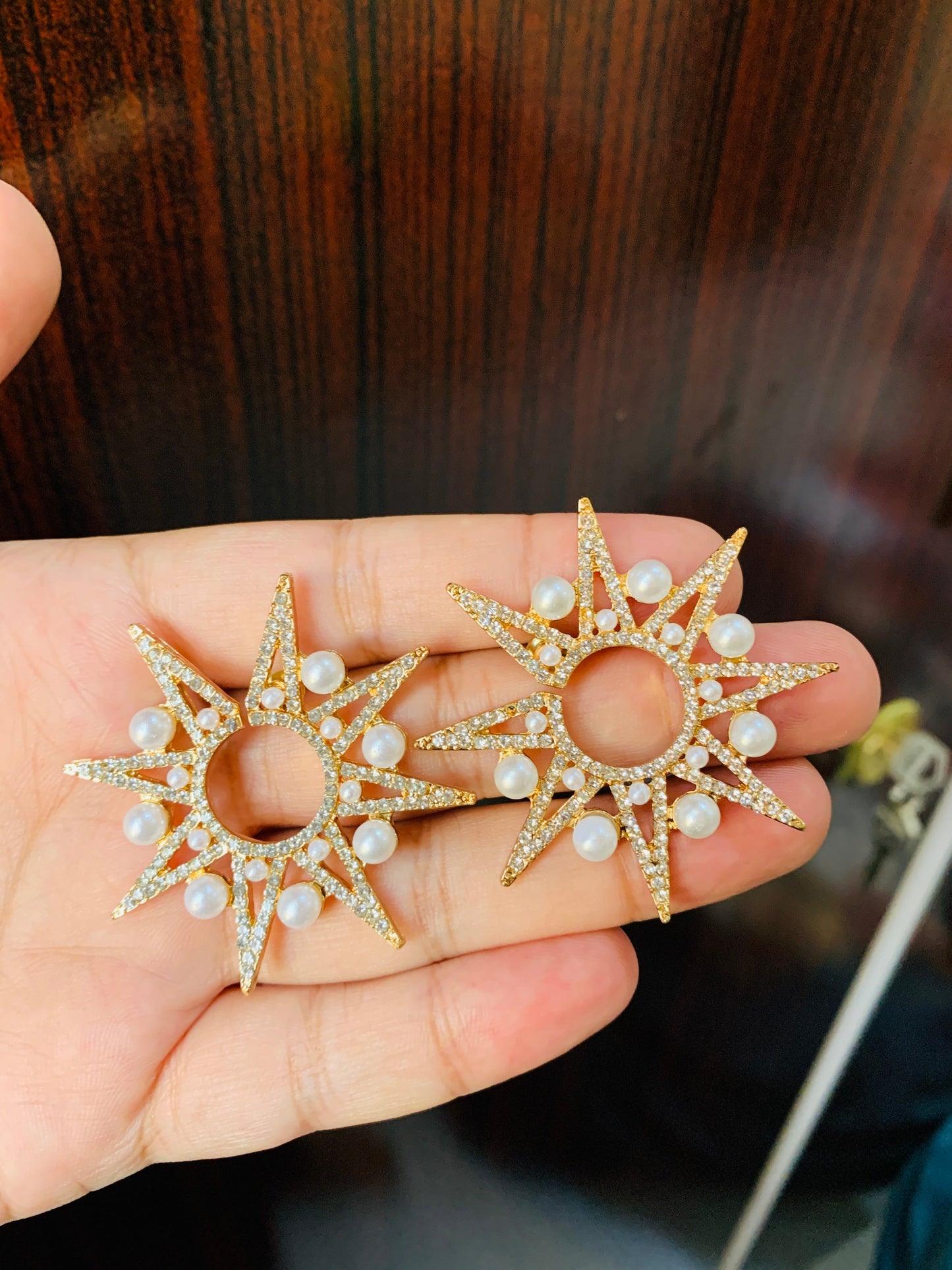 Gold colour star shape stud earrings